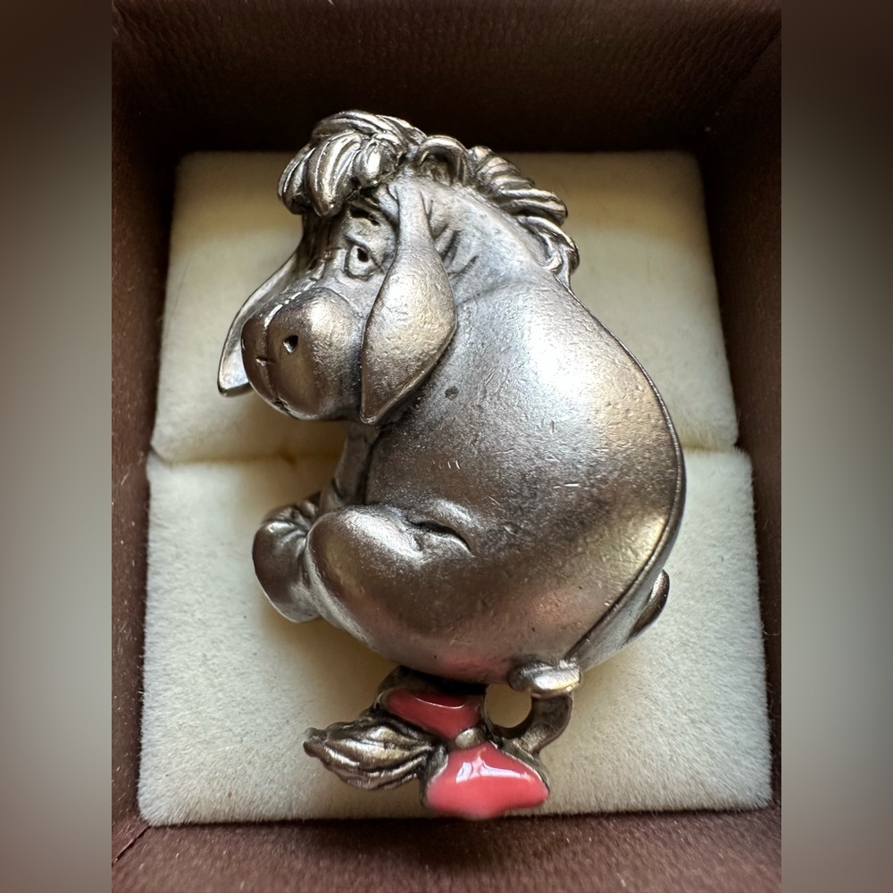 Vintage Disney Eeyore pin with pink bow